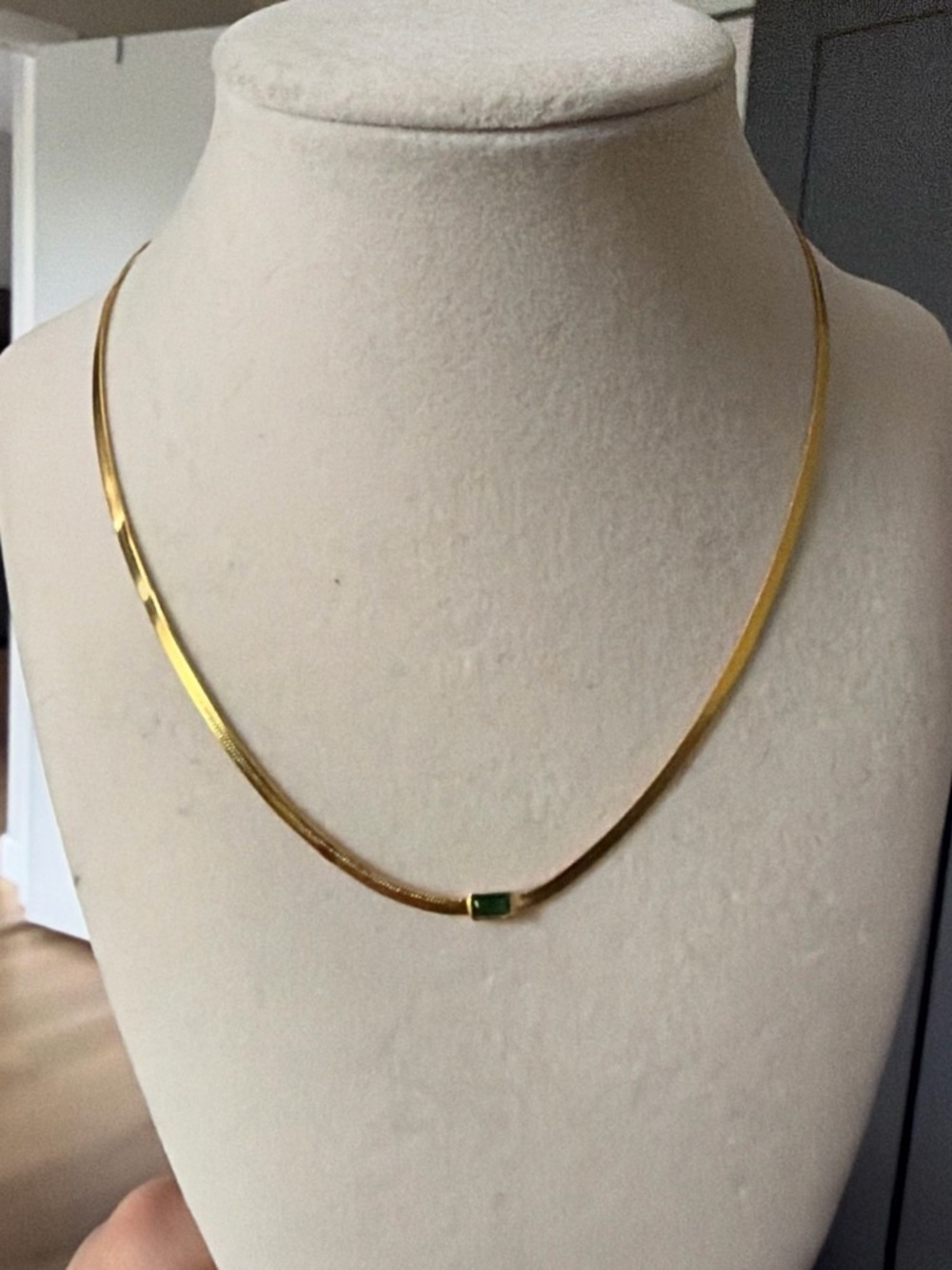 Gold Herringbone Necklace with Green Accent